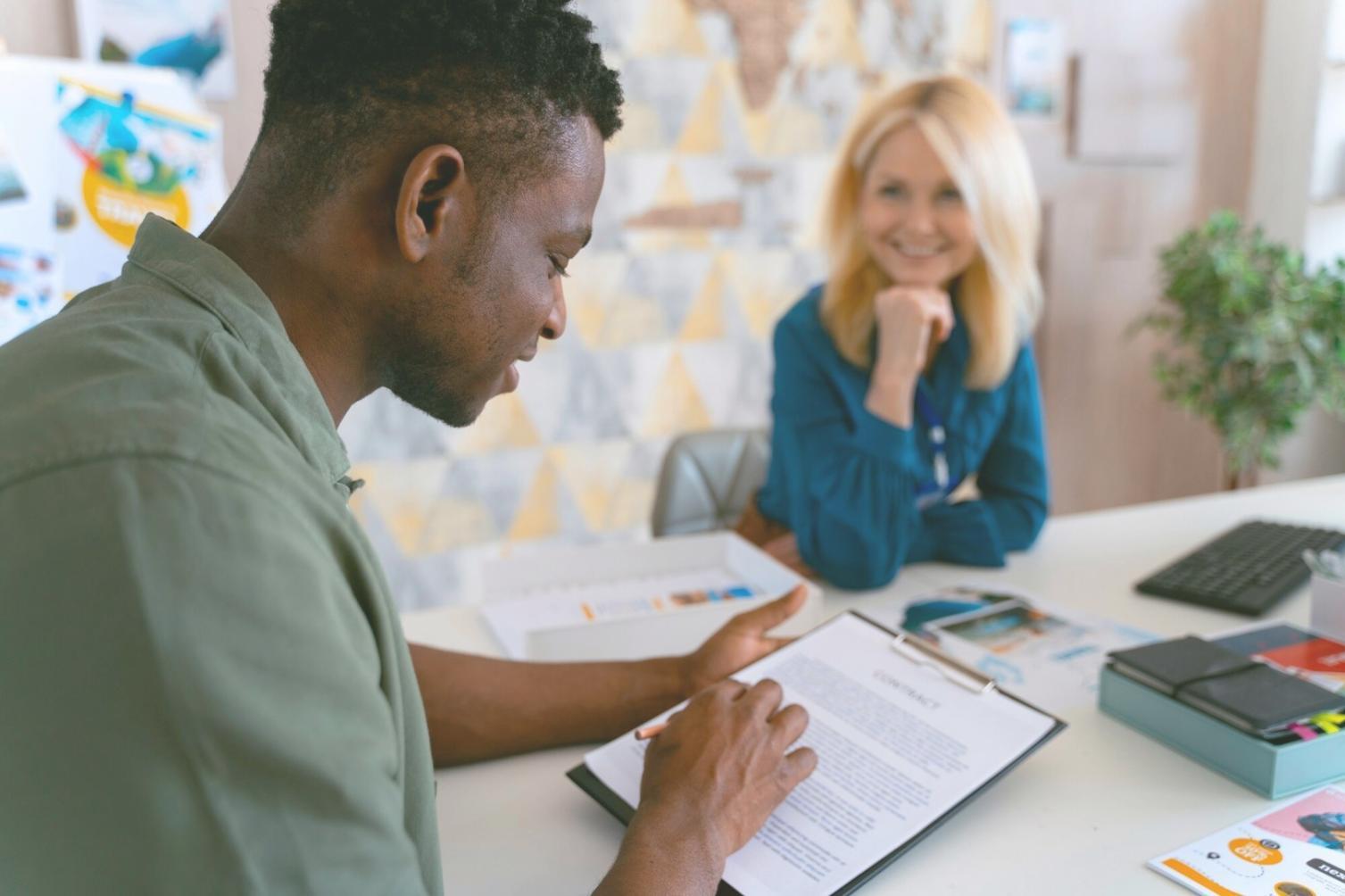 Financial planning consultation session showing documents and discussion